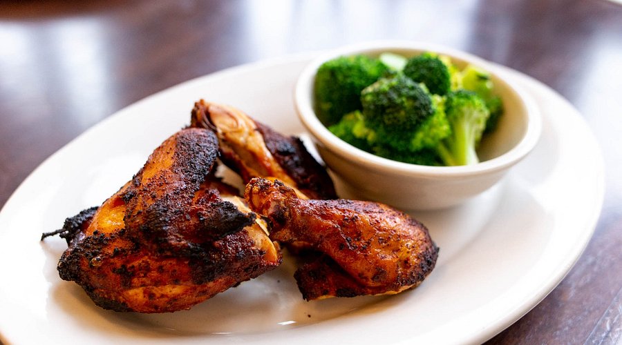 Doc Crow's Southern Smokehouse & Raw Bar signature dishes Sauteed SalmonFried Shrimp Po-BoyDoc’s Chicken